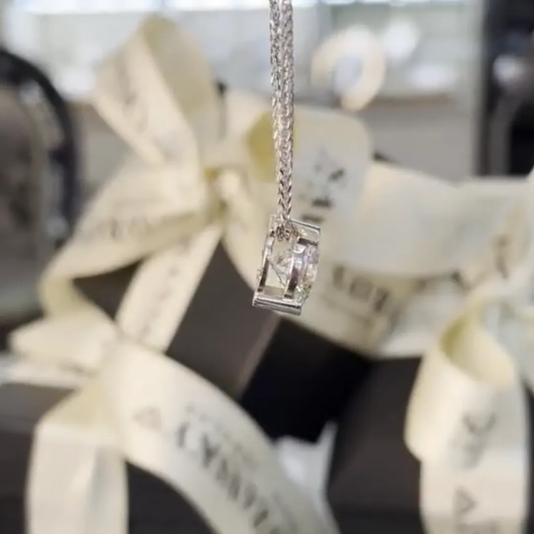 /public/photos/live/Round Moissanite Half Bezel Set Floating Pendant  628 (5).webp